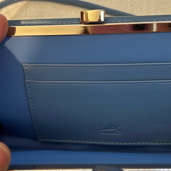 Light blue Lodi’s Clutch leather